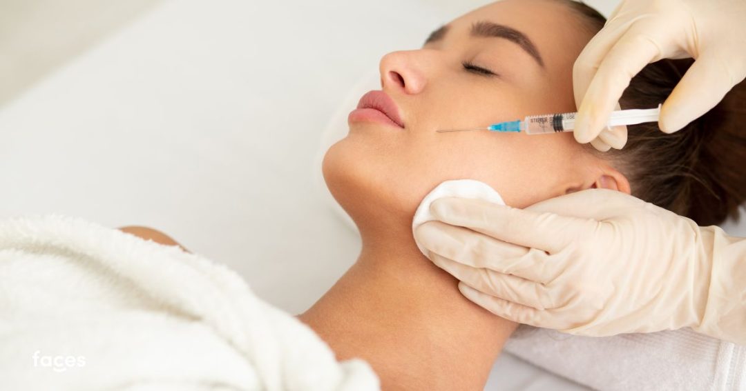 woman getting anti-wrinkle treatment on her face