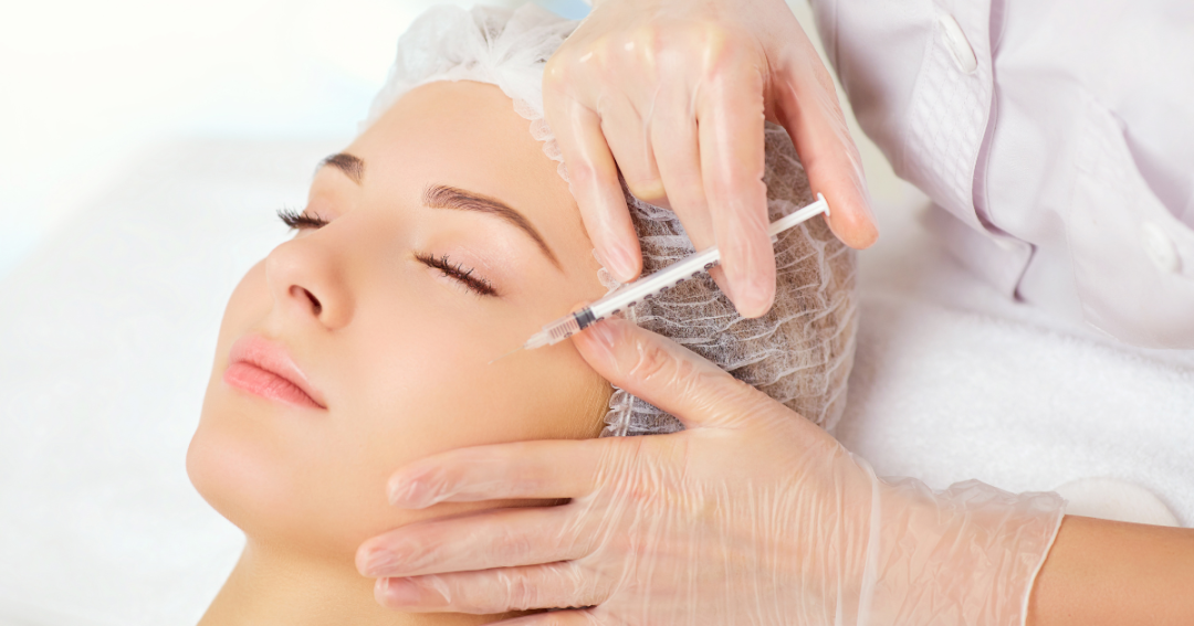 Close-up of a woman with radiant, flawless skin.