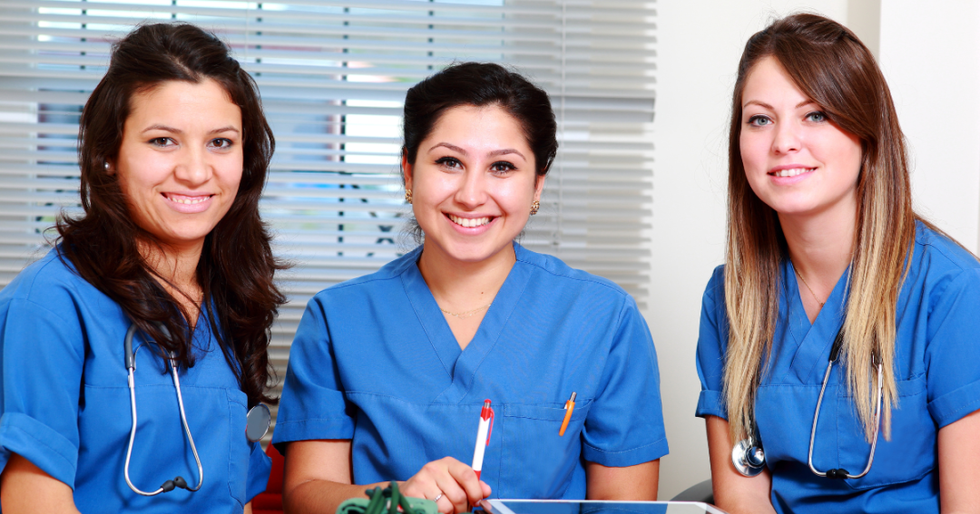 Nurse practitioners discussing Faces Consent procedures and patient care guidelines.