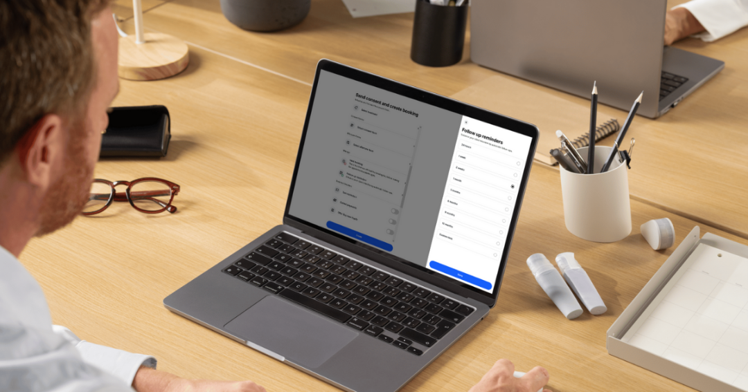 A client using a clinic booking software system at reception, highlighting how digital tools improve patient experience and client satisfaction.