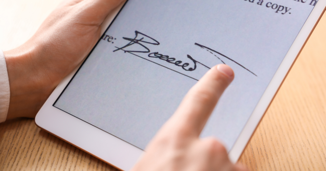 Botulinum Toxin Consent Form | Free Template for Aesthetic Clinics 1 Patient signing a digital consent form on a tablet at an aesthetic clinic.