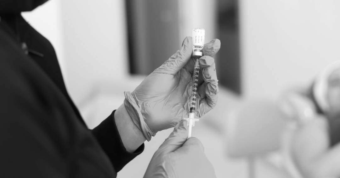 Inside the UK’s Illegal Botox Trade 1 Practitioner preparing a Botox treatment in a clinical setting, ensuring safety and sterile technique