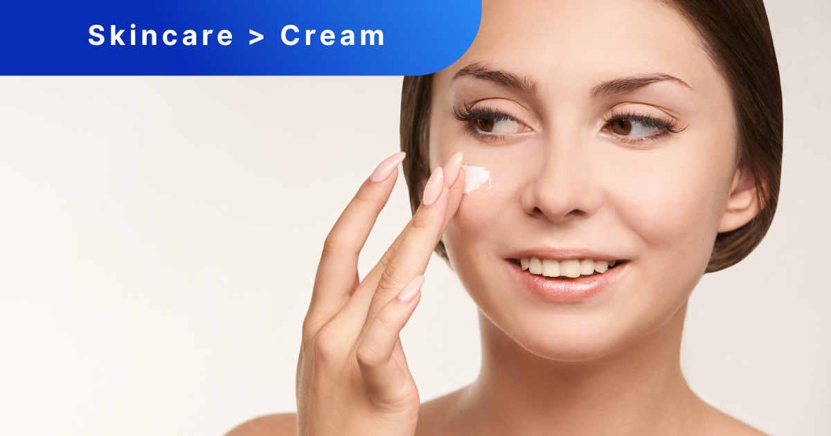 Woman putting face cream