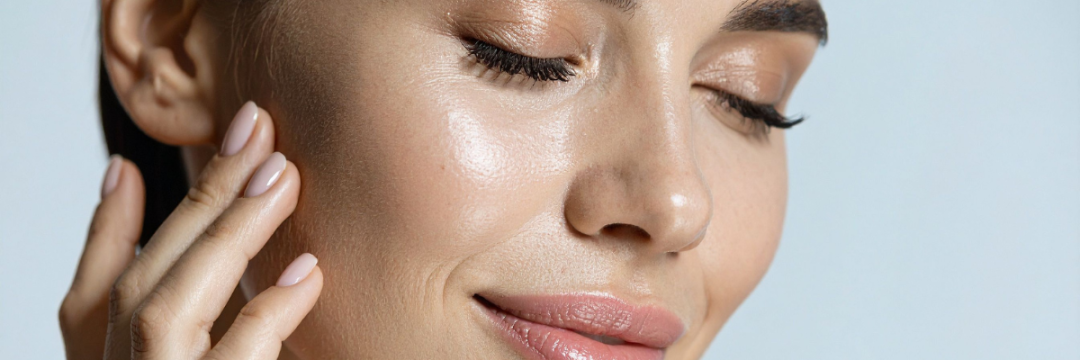 Woman with healthy, even-toned skin, representing realistic antioxidant skincare outcomes.