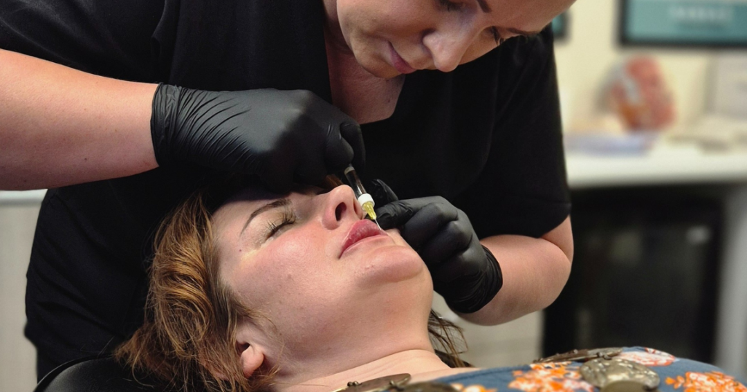 aesthetic practitioner doing lip fillers