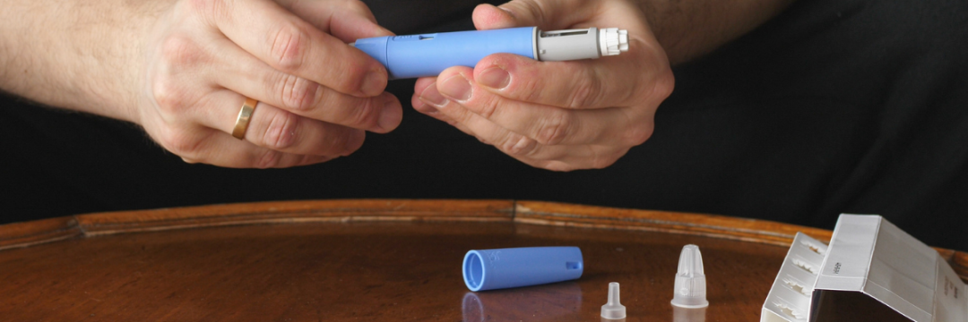  A patient preparing an injectable pen.